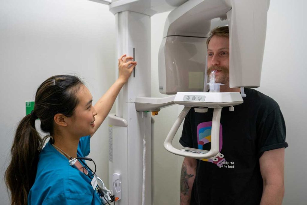 Dr. Qian with Patient