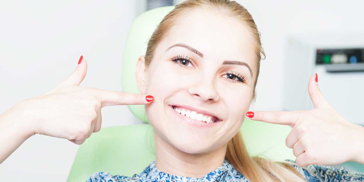 Girl is Showing Her Mouth