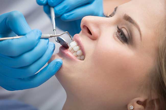 Doctor is Checking Patient's Mouth